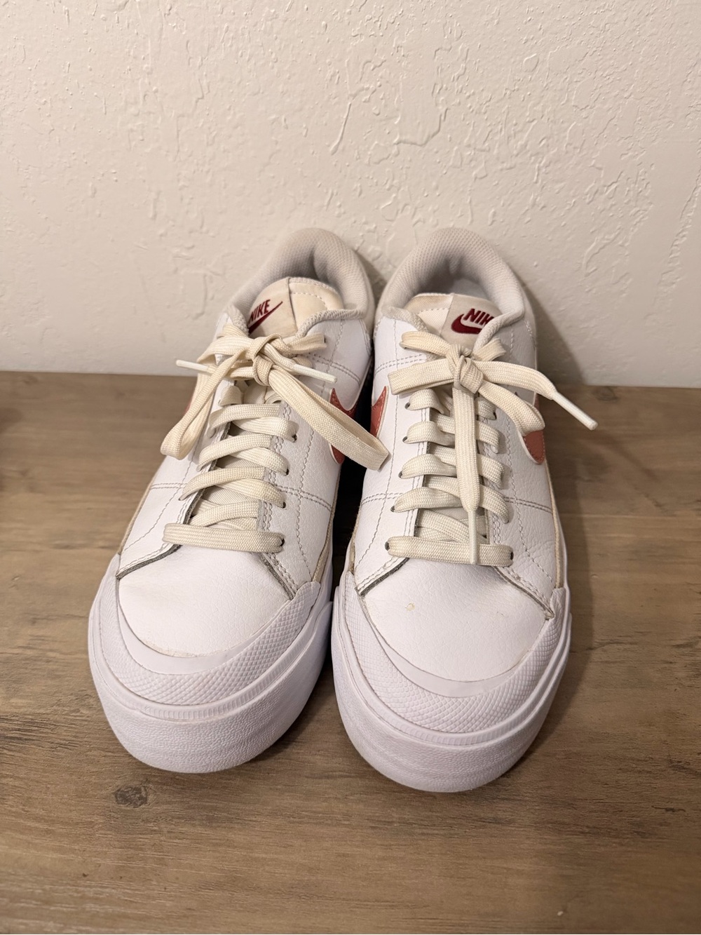 Nike White Low-Top Sneakers with Red Swoosh and Tan Accents